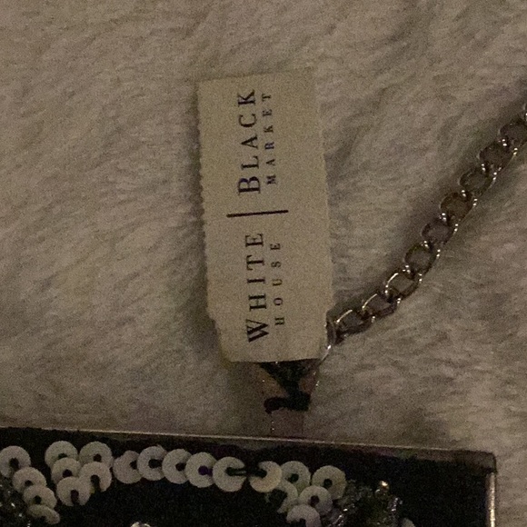 Sophisticated White House, Black market brand Black and Silver Floral Clutch - Picture 3 of 3